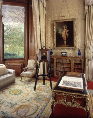 The Morning Room at Waddesdon Manor, with a view of the collection of illustrated books and bindings and a portrait of the collector Baron Ferdinand de Rothschild. Photo: John Bigelow Taylor © The National Trust, Waddesdon Manor