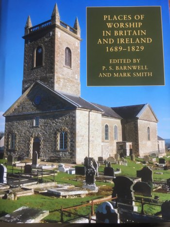 Front cover of the bookjacket, with a photograph of a church and cemetery.