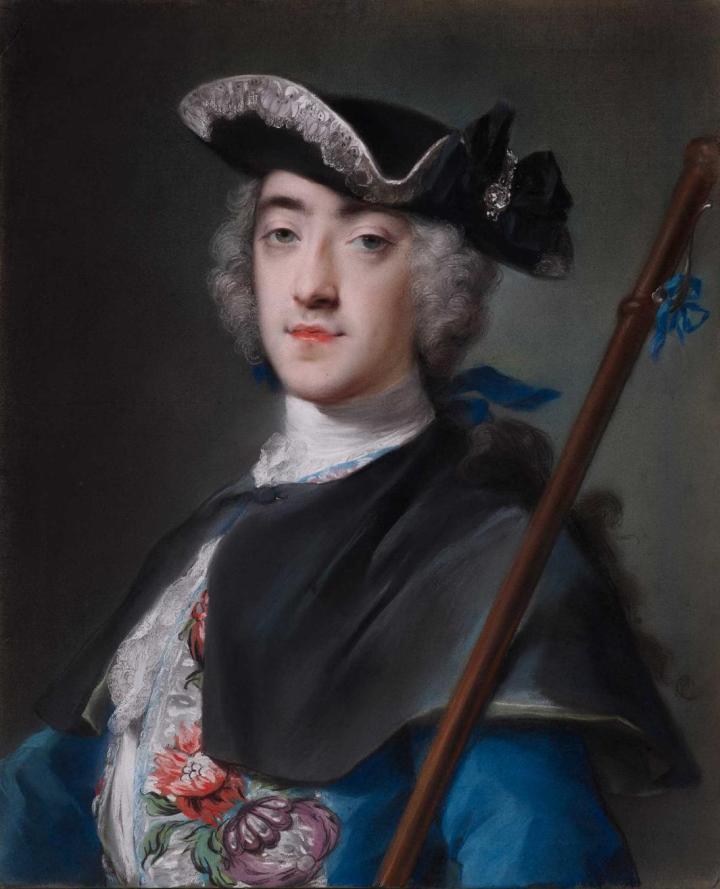 Pastel half length portrait of a man wearing a black hat on his head and holding a staff in his left hand