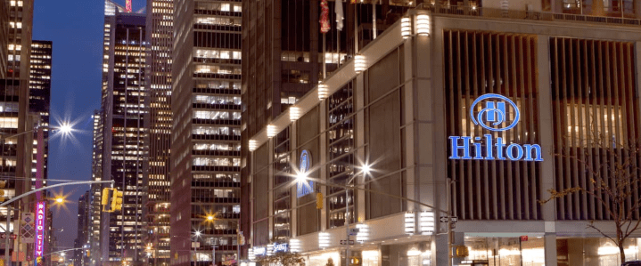 View of the New York Hilton Midtown Hotel at night
