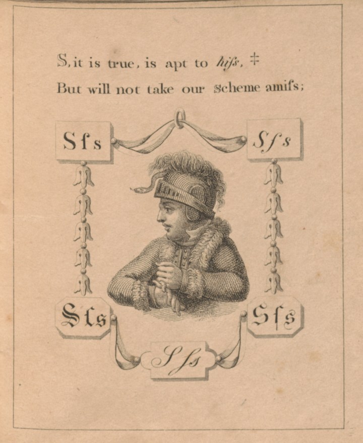 A boy in a fur-lined coat and knight’s helmet holds a left fist over his right hand, interlocking his pinkie fingers to sign ‘S’ in British Sign Language. A hissing snake emerges from his helmet’s curling plume and playfully mimics the letter’s sound.